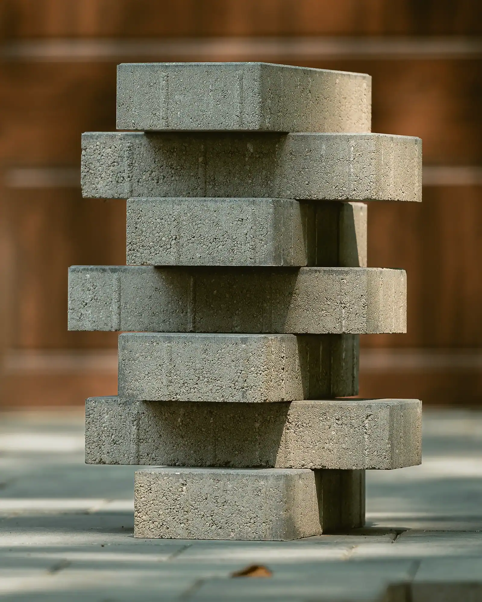 Stacked concrete pavers showing profile and texture